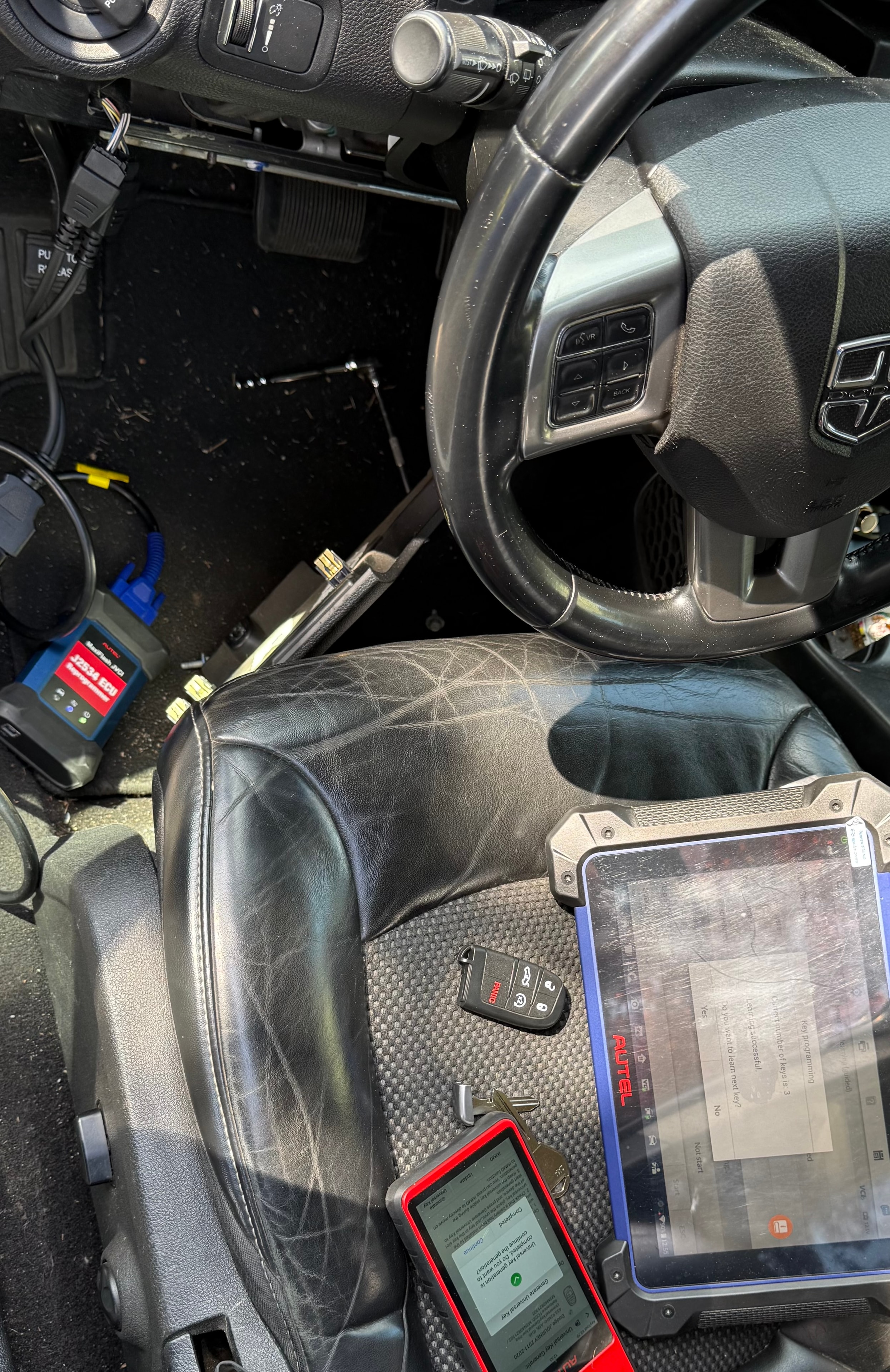 Autel MaxiIM and MaxiSys running simultaneously on Dodge Ram all-keys-lost job — locksmith Minnehaha WA