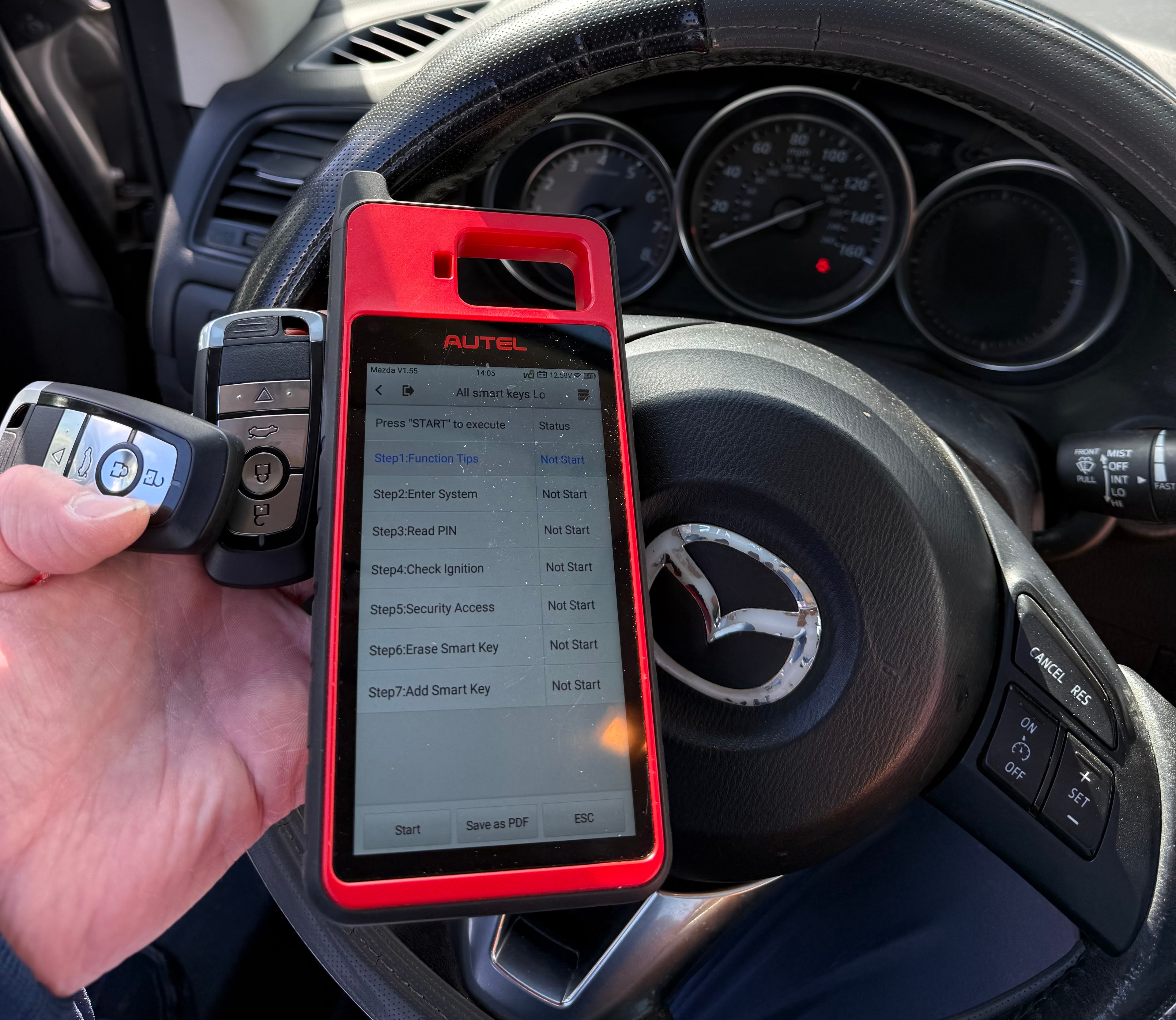 Autel programmer showing 2014 Mazda CX-5 all smart keys lost programming — Orion's Key Vancouver WA
